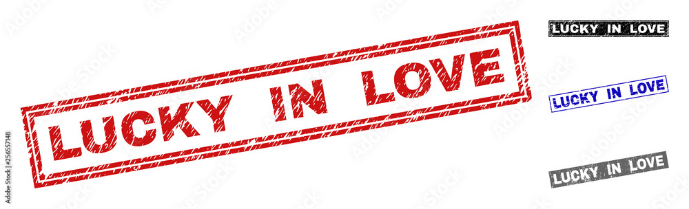Grunge LUCKY IN LOVE rectangle stamp seals isolated on a white background. Rectangular seals with distress texture in red, blue, black and grey colors. Grunge LUCKY IN LOVE rectangle stamp seals isolated on a white background. Rectangular seals with distress texture in red, blue, black and grey colors.