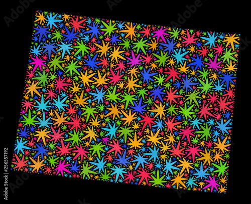Bright vector marijuana Wyoming State map mosaic on a black background. Concept with bright weed leaves for weed legalize campaign. Vector Wyoming State map is designed from marijuana leaves.