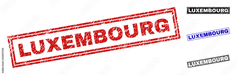 Grunge LUXEMBOURG rectangle stamp seals isolated on a white background. Rectangular seals with grunge texture in red, blue, black and grey colors. Grunge LUXEMBOURG rectangle stamp seals isolated on a white background. Rectangular seals with grunge texture in red, blue, black and grey colors.