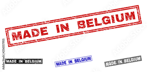 Grunge MADE IN BELGIUM rectangle stamp seals isolated on a white background. Rectangular seals with distress texture in red, blue, black and grey colors.