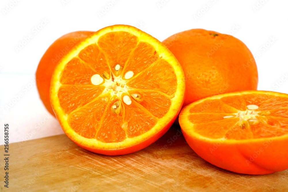 Close up of golden orange isolated on white background with copy and paste space Close up of golden orange isolated on white background with copy and paste space