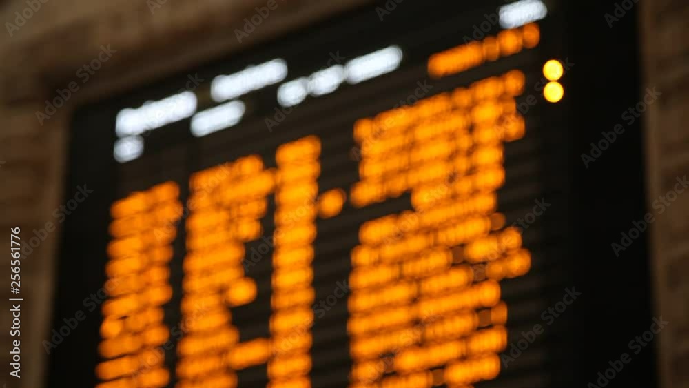 information board with public transport timetable, soft focused background information board with public transport timetable, soft focused background