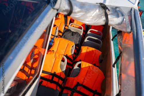 orange life jacket on the boat © Sunanta