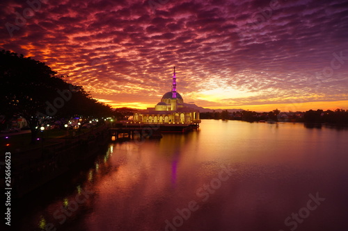 wonderful sunset with islamic mosque and bridge at kuching sarawak