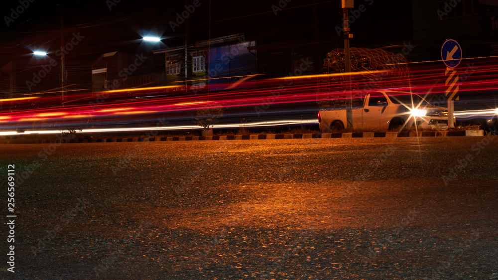 Car lights with paved roads at night. Car lights with paved roads at night.