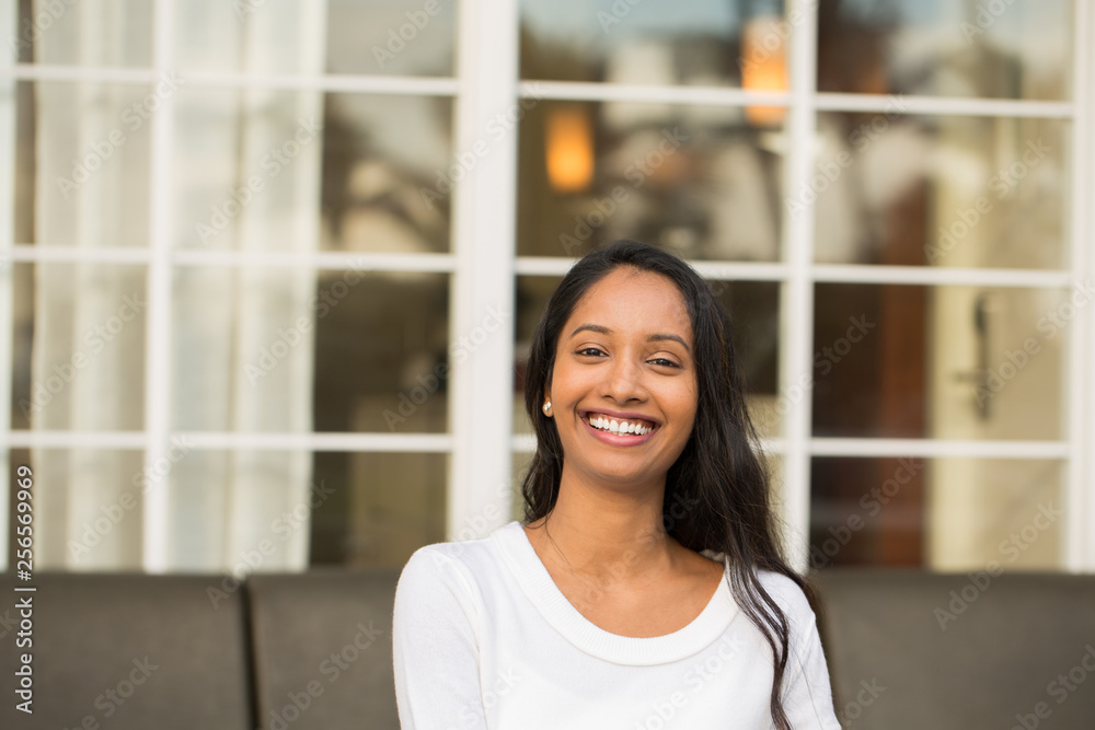 Portrait of a young beautiful hispanic woman smiling. Portrait of a young beautiful hispanic woman smiling.