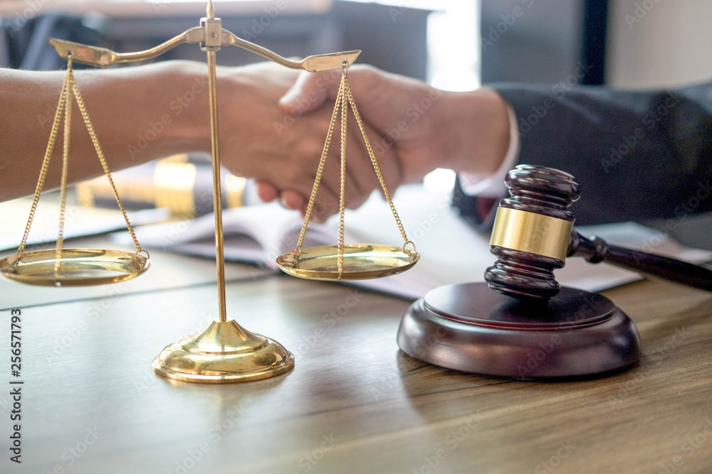 gavel and soundblock of justice law and lawyer working on wooden desk background. gavel and soundblock of justice law and lawyer working on wooden desk background.
