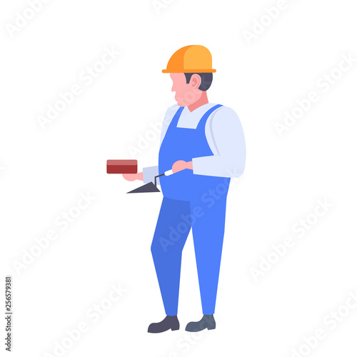 man builder holding trowel and wall brick guy wearing uniform and helmet construction worker professional occupation concept male cartoon character full length flat isolated
