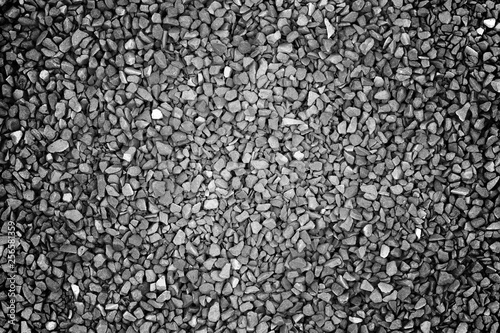 Black (gray) small crushed stones background texture