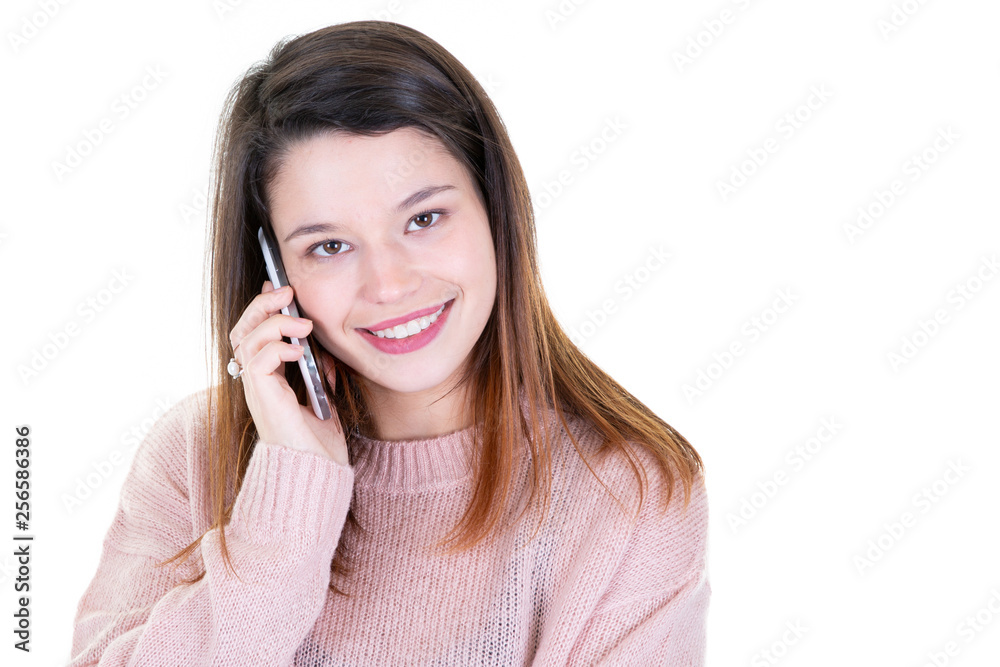 Portrait of smiling young pretty woman talk on cell smart phone isolated on white background Portrait of smiling young pretty woman talk on cell smart phone isolated on white background