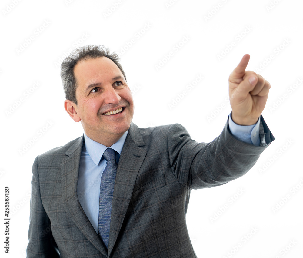 Portrait of a middle aged confident businessman pointing at copy space. Isolated on white. Portrait of a middle aged confident businessman pointing at copy space. Isolated on white.
