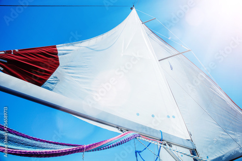 Sails of a sailing yacht in the wind