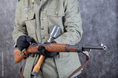 rifle and grenade of the German soldier in jacket the second world war