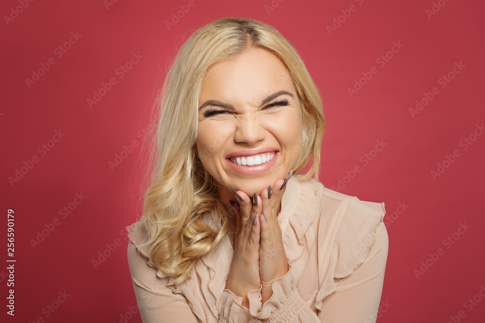 Portrait of excited young casual woman screaming on pink background Portrait of excited young casual woman screaming on pink background