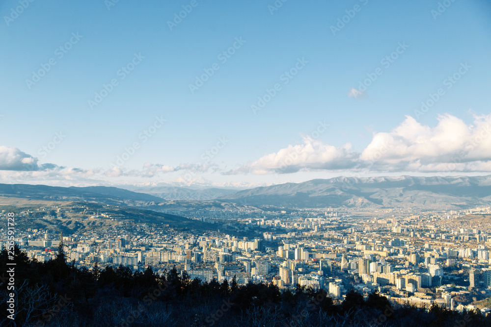 Sunset and evening city Tbilisi, Georgia. Panoramic views and lights of historic neighborhoods. Sunset and evening city Tbilisi, Georgia. Panoramic views and lights of historic neighborhoods.