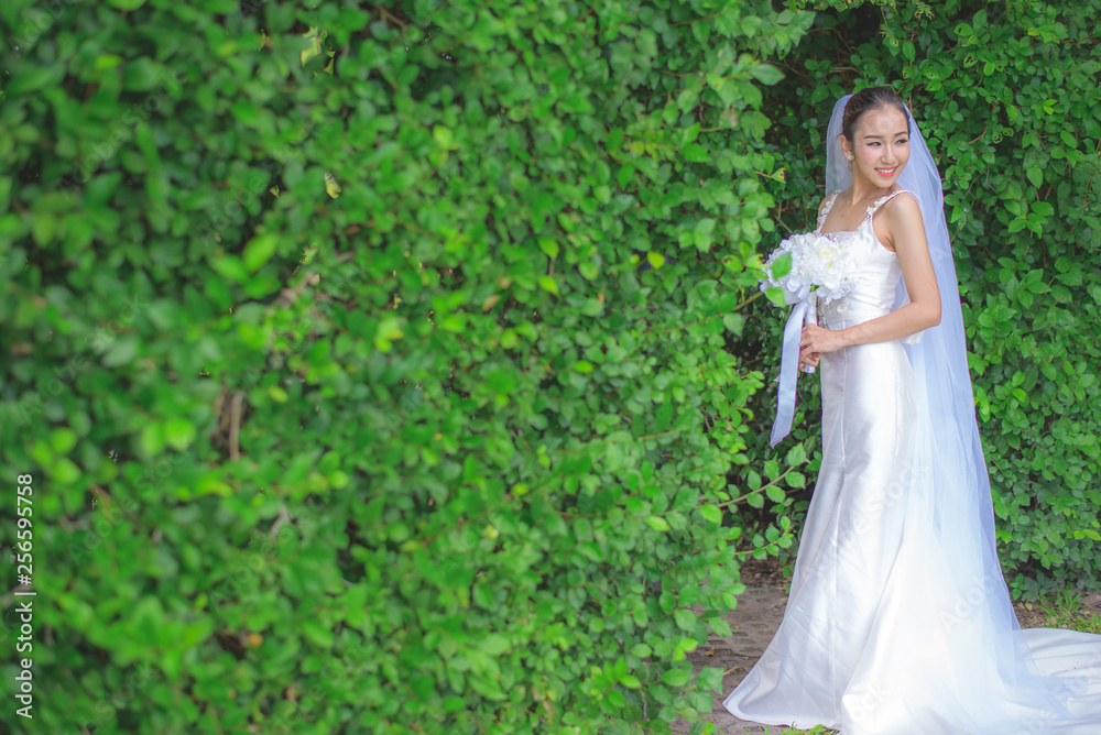 Wedding concept. Beautiful bride with bouquet Wedding concept. Beautiful bride with bouquet