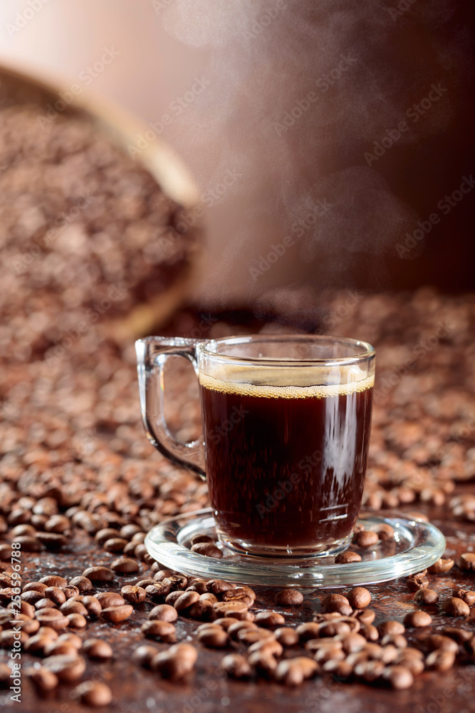 Coffee cup with roasted coffee beans. Coffee cup with roasted coffee beans.