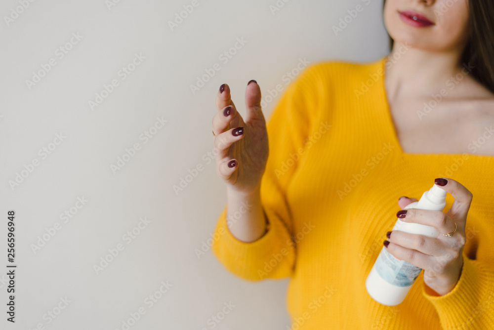 Hand disinfection. Beautician cleans hands before the procedure.