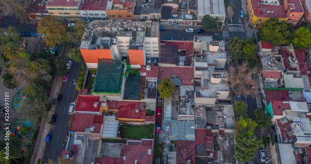 Aerial hyperlapse with dolly in tilt up camera move of a very big and crowded pour neighborhood in Mexico City with the rich financial center of Santa Fe at the back. Aerial hyperlapse with dolly in tilt up camera move of a very big and crowded pour neighborhood in Mexico City with the rich financial center of Santa Fe at the back.
