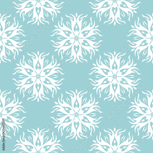 White floral design on blue seamless background