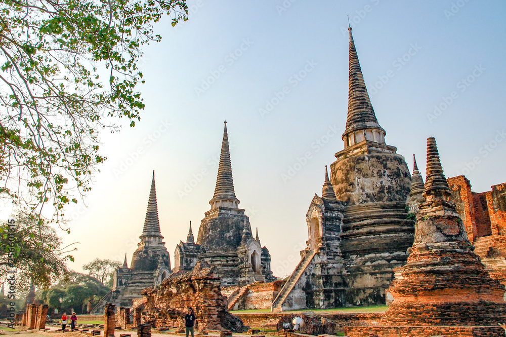 Ruin of Wat Mahathat in Ayutthaya, Thailand. Landmark Historical temple in Thailand with sunset twilight. Ruin of Wat Mahathat in Ayutthaya, Thailand. Landmark Historical temple in Thailand with sunset twilight.