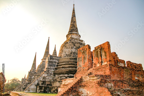Ruin of Wat Mahathat in Ayutthaya  Thailand. Landmark Historical temple in Thailand with sunset twilight.
