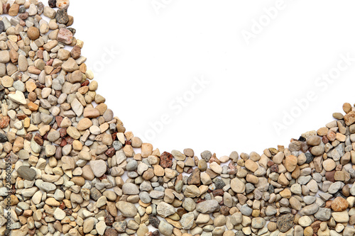 Ground stones border isolated on white background. Curved border of pebble stones.