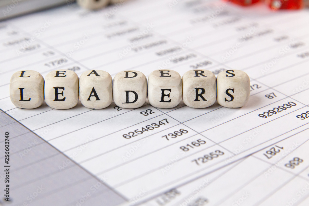 The leaders word on wood cube business content image. The leaders word on wood cube business content image.