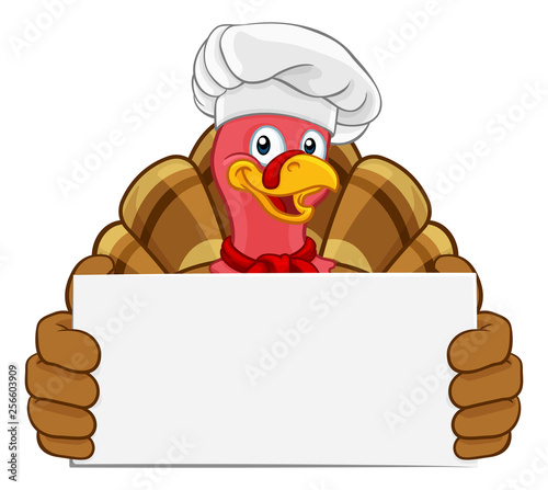 Chef Turkey Thanksgiving or Christmas bird animal cartoon character. Wearing a chefs hat and holding a background sign