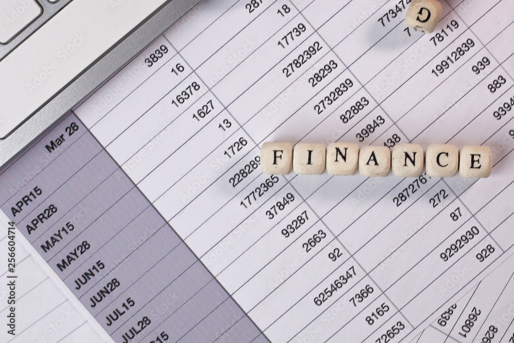 The finance word on wood cube business content image. The finance word on wood cube business content image.