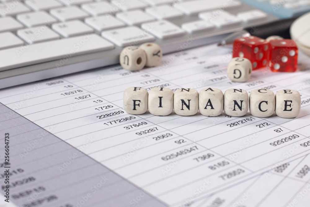 The finance word on wood cube business content image. The finance word on wood cube business content image.