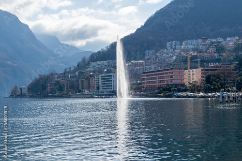 View of central Lugano with lake and fountain in March