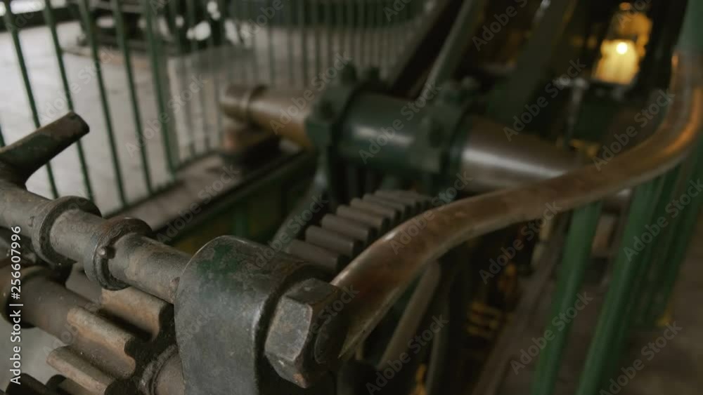 Wide angle rack focus shot of a stationary steam engine Wide angle rack focus shot of a stationary steam engine