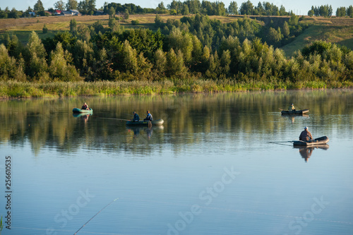 lake with fishermen on a Sunny morning