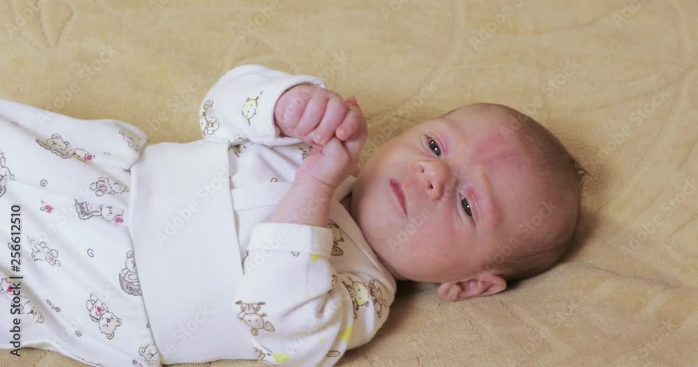 Lying on the bed sheet baby Lying on the bed sheet baby