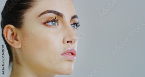 Portrait close up of young woman with beautiful face and perfect skin just cleaned from impurities ready for day or night cream.