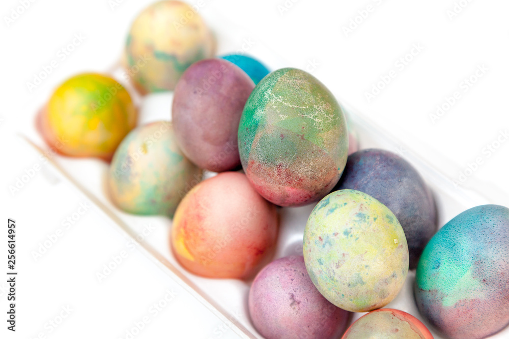Easter painted eggs folded in plastic container Easter painted eggs folded in plastic container