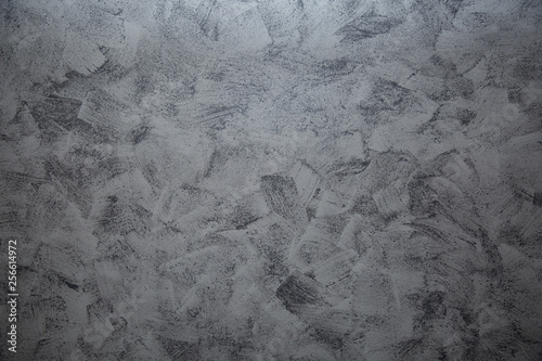 Dramatic grey grunge seamless stone texture venetian plaster background decor. Gray seamless stone venetian plaster texture.