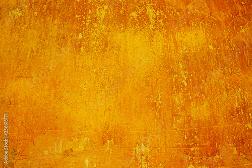 Abstract orange brick color circle plaster on the cement wall. Beautiful art interior building.
