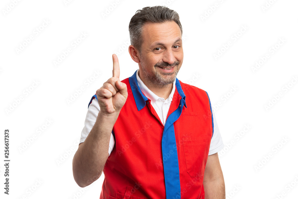 Hypermarket employee making number one gesture. Hypermarket employee making number one gesture.