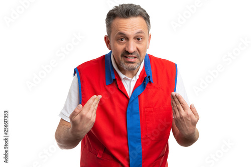 Hypermarket employee pointing at himself.