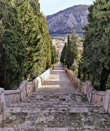 Calvari steps, pollenca, view from top with no people and lone black cat, mallorca, spain.