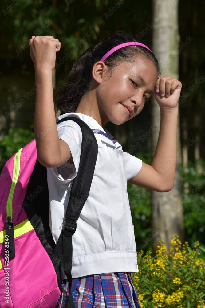 Naklejka premium Toned Young Filipina Female Student Wearing School Uniform