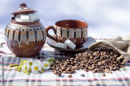 Coffee grinder, coffee beans and cups decoration