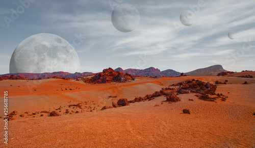 Fototapeta Naklejka Na Ścianę i Meble -  Red planet with arid landscape, rocky hills and mountains, and a giant Mars-like moon at the horizon, for space exploration and science fiction backgrounds. Elements of this image furnished by NASA.