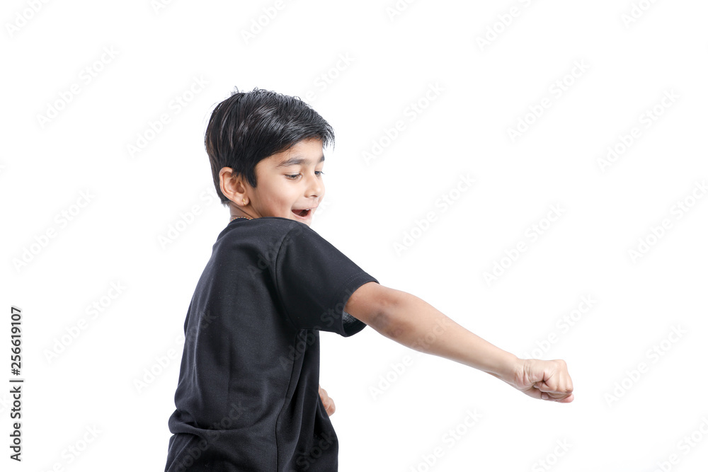 Cute Indian little boy playing , running and giving multiple expression Cute Indian little boy playing , running and giving multiple expression