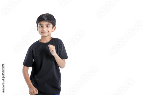 Cute Indian little boy playing , running and giving multiple expression
