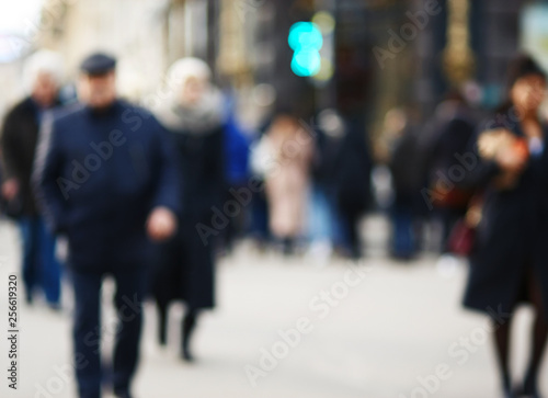 Blurred background where a crowd of ordinary people cross the road in the morning at a city intersection in rush hour ©  Valeri Vatel