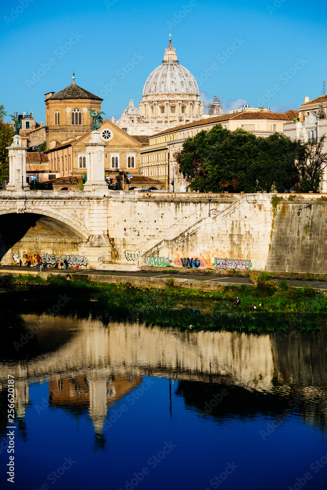 Basilica of San Pietro Rome, seen from the bridge over the Tiber in the morning at dawn