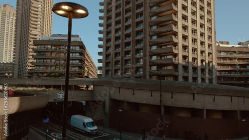 Panning shot of the Barbican Centre in London, a large residential complex famous for its Brutalist architecture